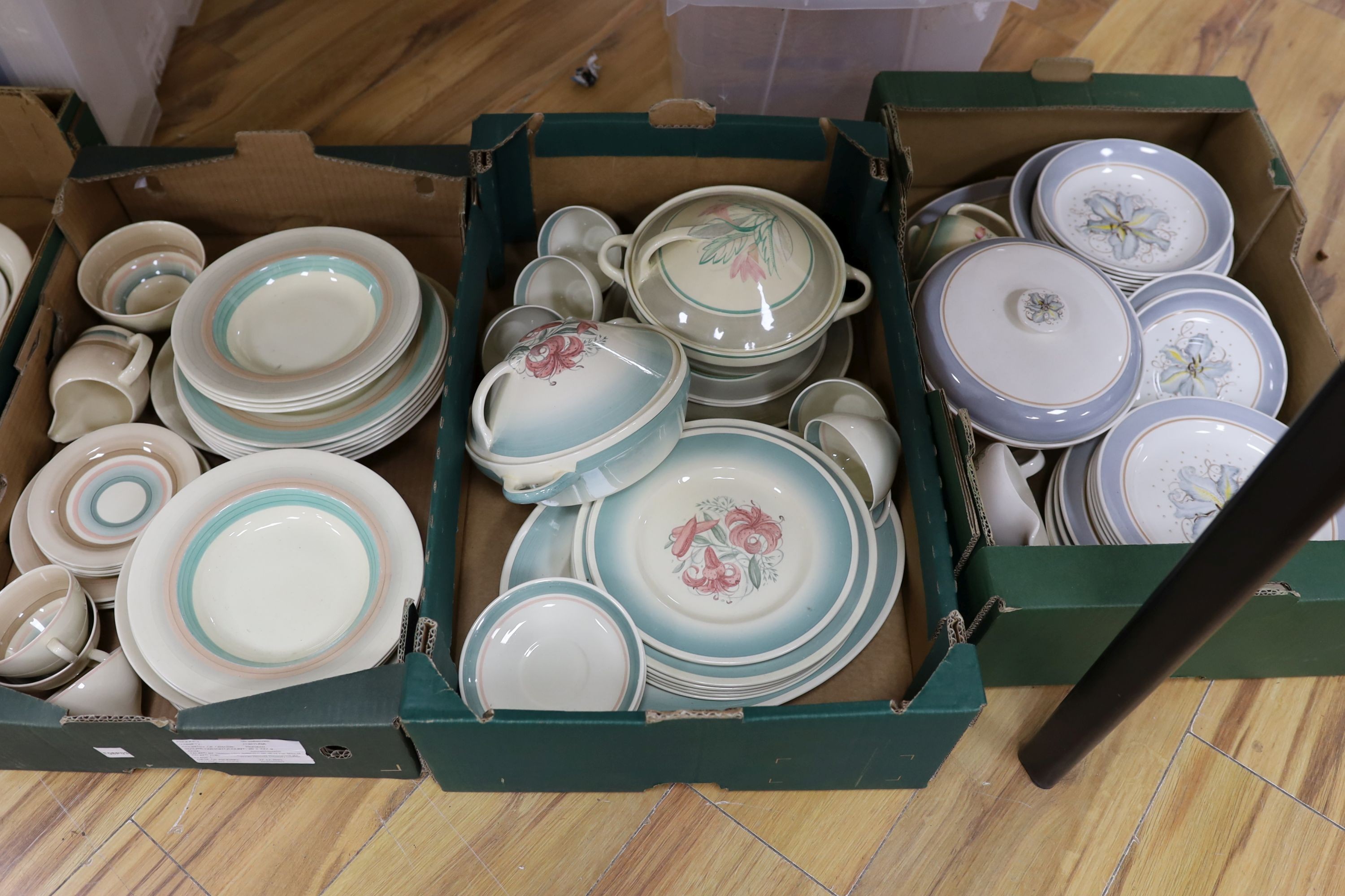 A large quantity of Susie Cooper tableware, Wedding Band, Tiger Lily and Blue Magnolia